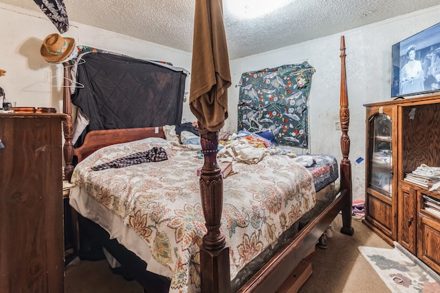 carpeted bedroom with a textured ceiling