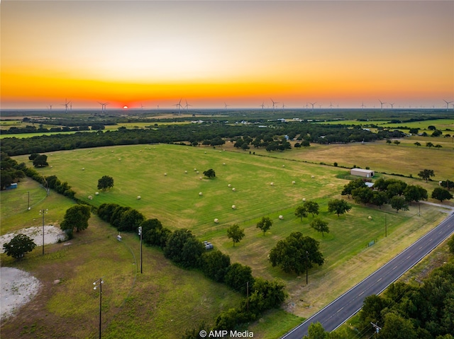 aerial view at dusk with a rural view