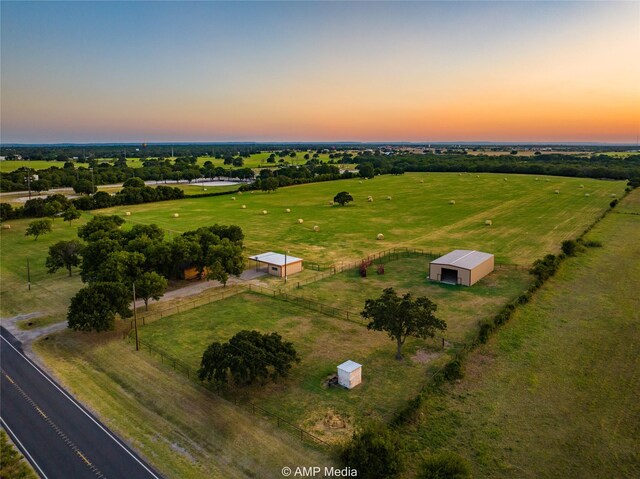 aerial view at dusk with a rural view