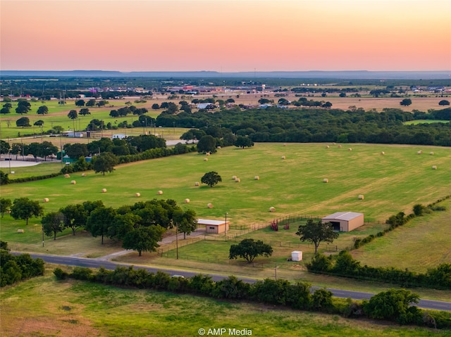 aerial view at dusk with a rural view