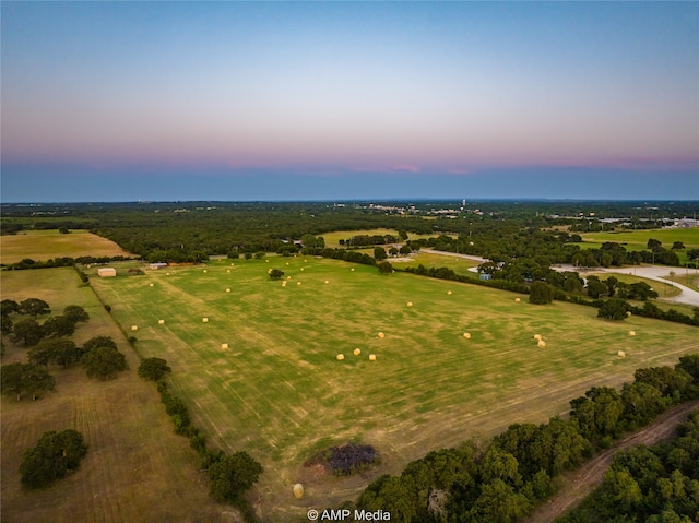 aerial view at dusk with a rural view