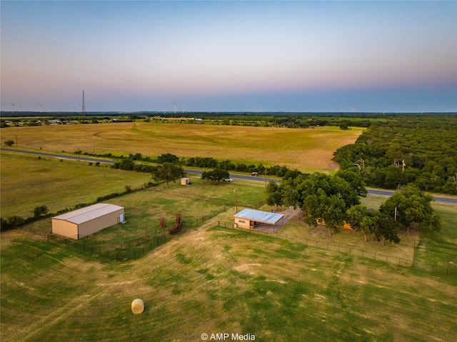 aerial view at dusk with a rural view