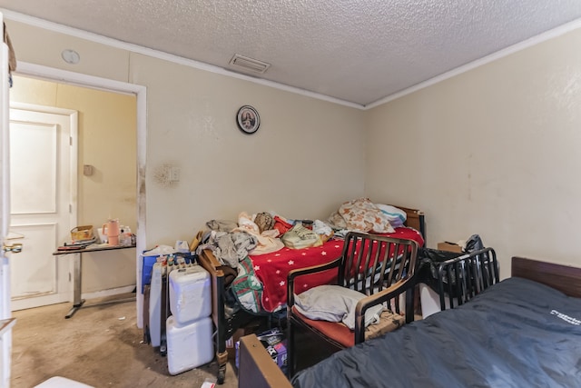 bedroom with crown molding and a textured ceiling