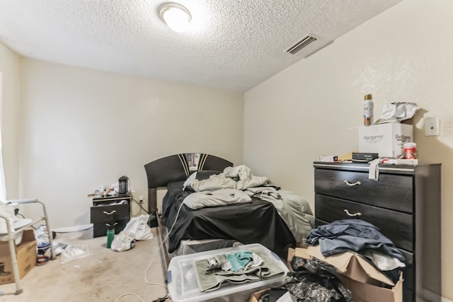 bedroom with a textured ceiling