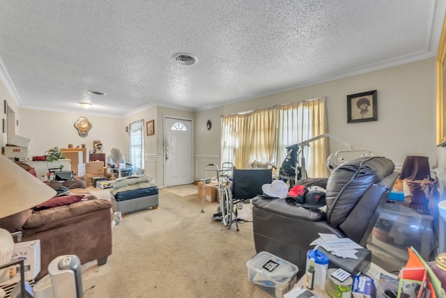 living room featuring carpet flooring, crown molding, a wealth of natural light, and a textured ceiling