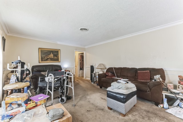 living room featuring ornamental molding, carpet floors, and a textured ceiling