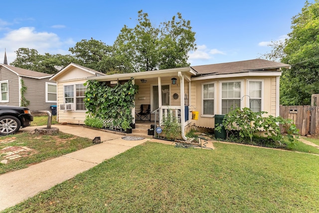 single story home with a front yard