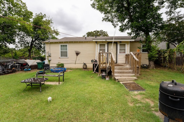 back of house with a yard