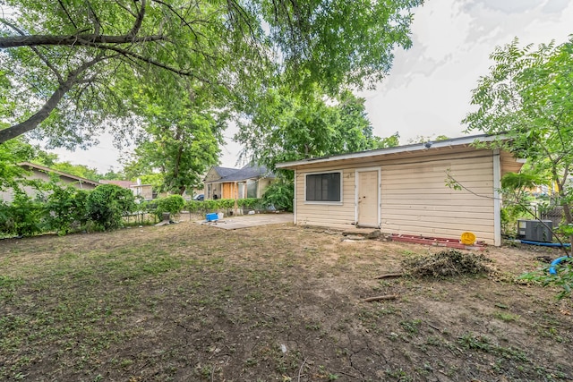 view of yard with central AC unit