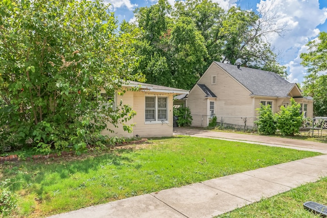 view of front of home with a front yard