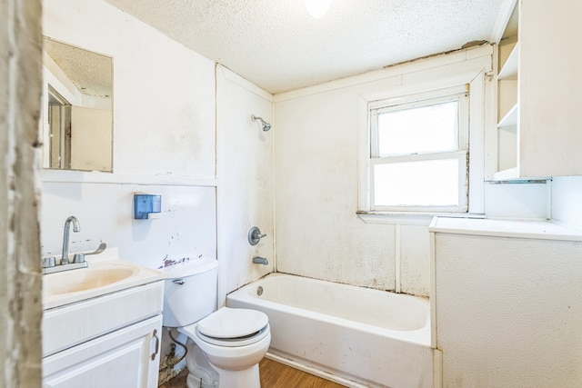 full bathroom featuring toilet, vanity, a textured ceiling, shower / bathtub combination, and wood-type flooring