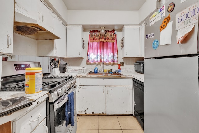 kitchen with white cabinets, black appliances, light countertops, and light tile patterned flooring