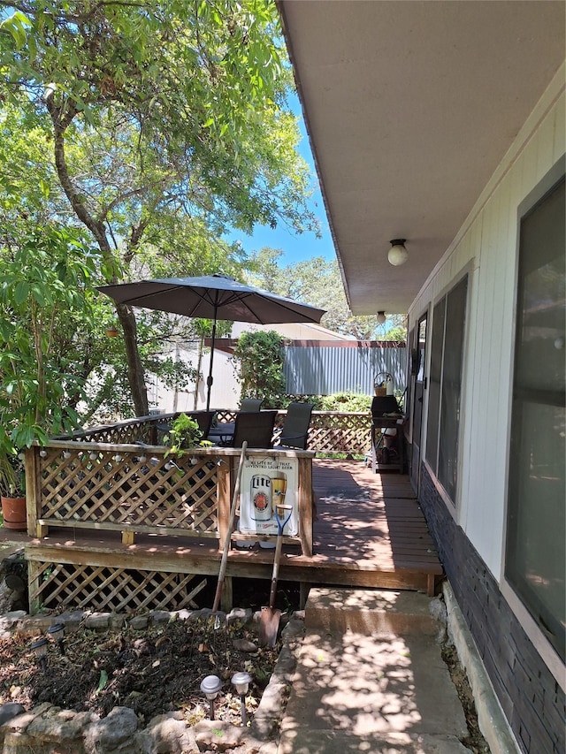 view of patio with a wooden deck