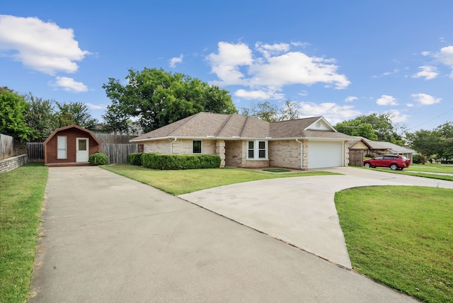 ranch-style home featuring a garage and a front yard