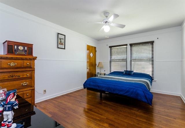 bedroom featuring hardwood / wood-style flooring and ceiling fan