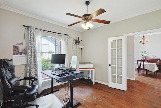 office space featuring dark hardwood / wood-style flooring, ceiling fan with notable chandelier, ornamental molding, and french doors