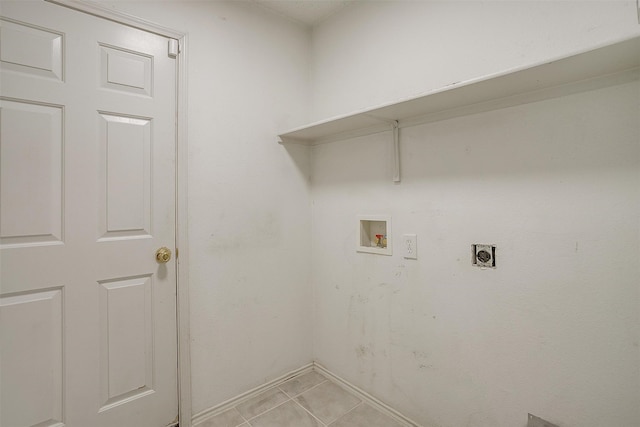 clothes washing area with light tile patterned floors, hookup for a washing machine, and hookup for an electric dryer