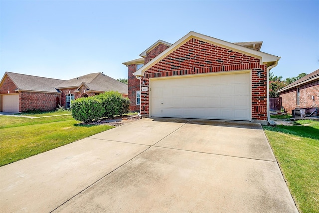 front of property featuring a garage and a front lawn