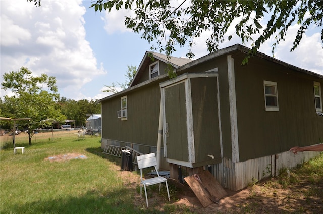 view of property exterior featuring a yard