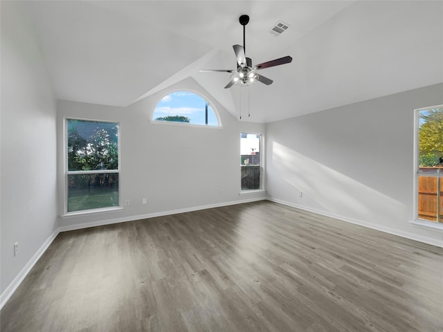 unfurnished living room featuring ceiling fan, vaulted ceiling, and hardwood / wood-style floors