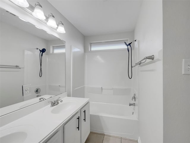 bathroom with tile patterned floors, bathing tub / shower combination, and vanity