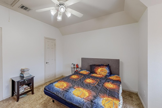 bedroom featuring ceiling fan, lofted ceiling, and carpet