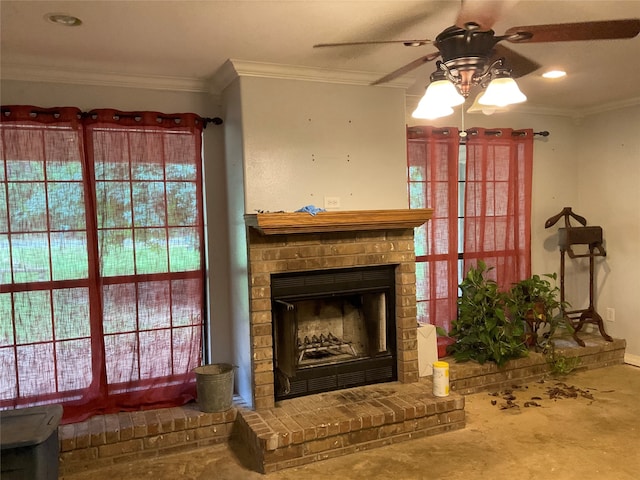 living room featuring ceiling fan, a fireplace, and crown molding