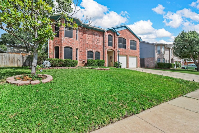 view of front of house featuring a garage and a front lawn