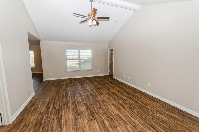 unfurnished living room featuring dark wood-type flooring, ceiling fan, beam ceiling, and a wealth of natural light