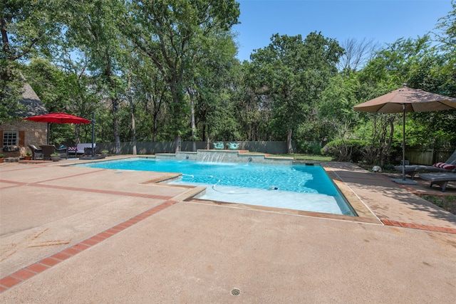 view of pool featuring a patio and pool water feature