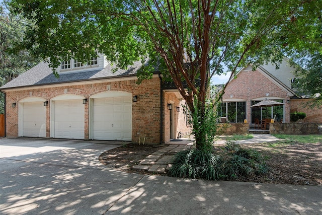 view of front of home with a garage