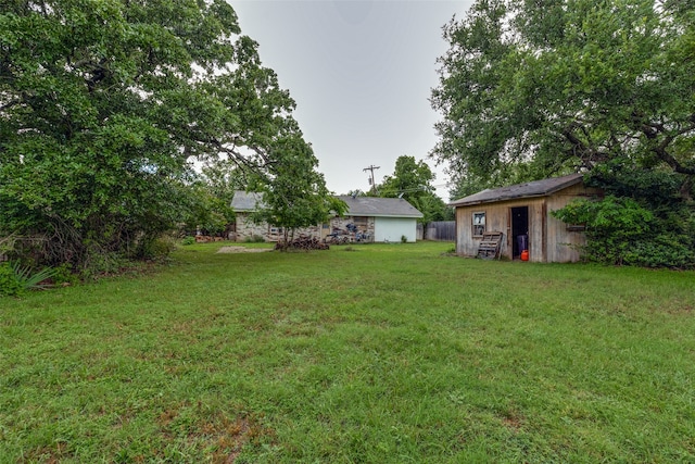 view of yard with a storage shed