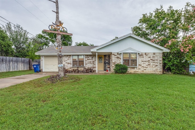 single story home with a front yard and a garage