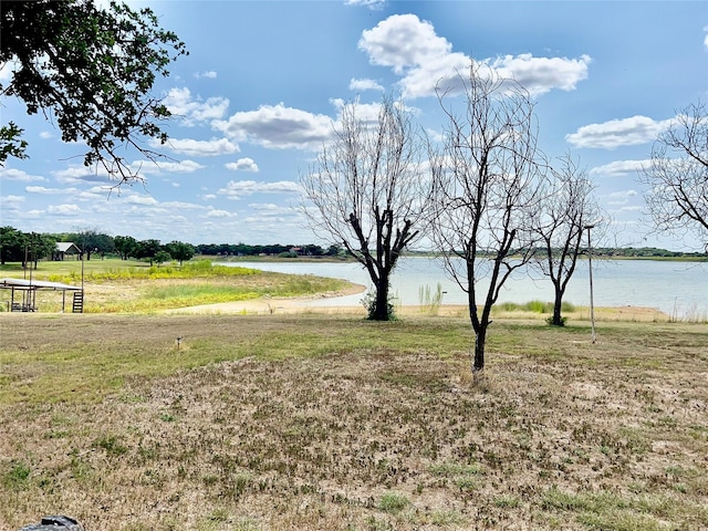 view of yard with a water view