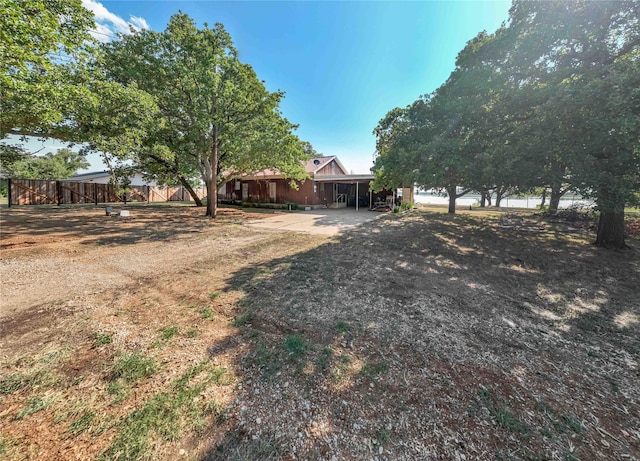 view of yard with a carport