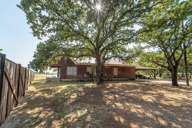 view of yard featuring a carport