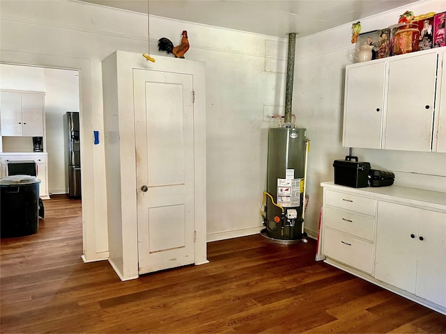 utility room with gas water heater