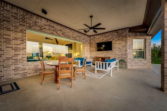 view of patio / terrace featuring ceiling fan