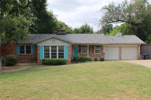 single story home featuring a garage and a front yard