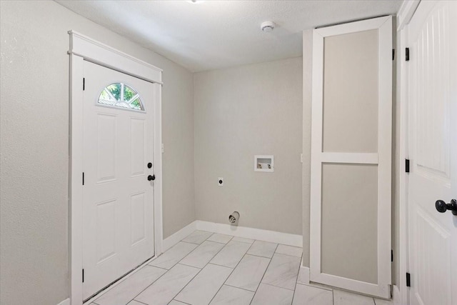 clothes washing area with hookup for a washing machine and electric dryer hookup