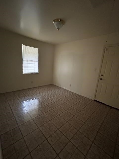 view of tiled empty room