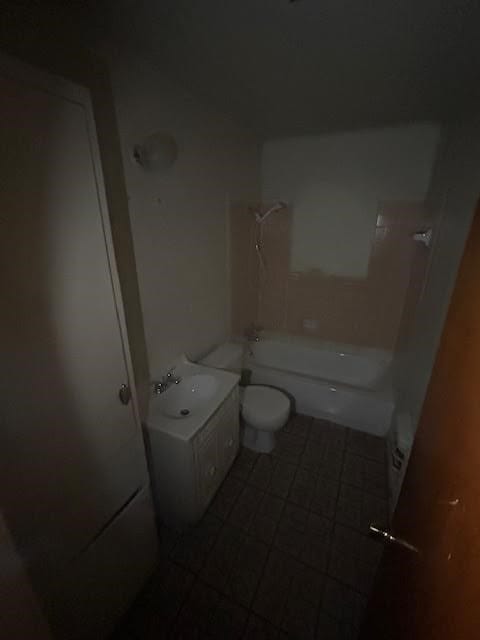 full bathroom featuring sink, shower / bath combination, tile patterned flooring, and toilet