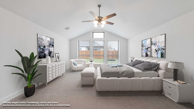 bedroom with carpet, ceiling fan, and lofted ceiling