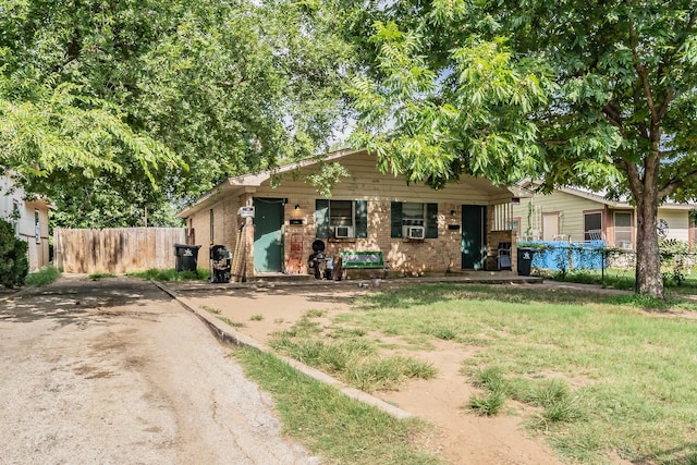 view of front of home with cooling unit