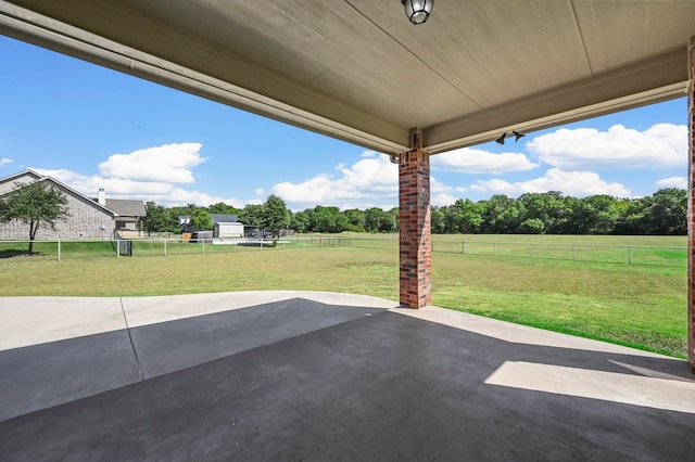 view of patio with a rural view