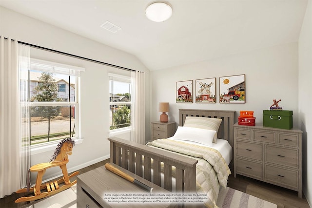 bedroom with dark hardwood / wood-style flooring and vaulted ceiling