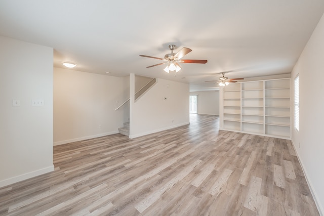 interior space featuring ceiling fan and light hardwood / wood-style floors