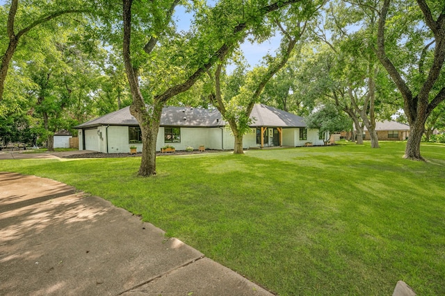 view of yard featuring a garage