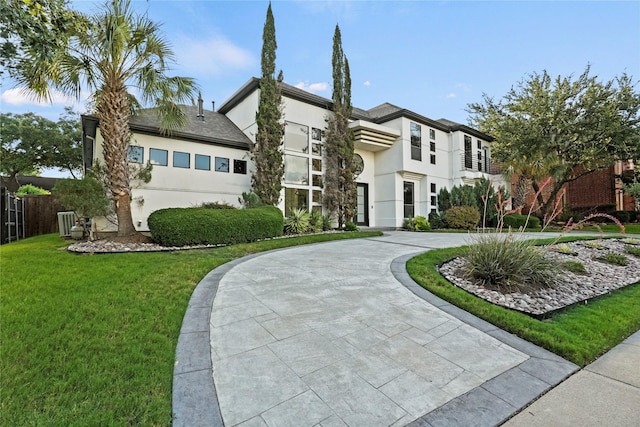 view of front of home with a front lawn