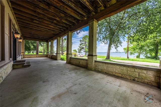 view of patio / terrace with a water view